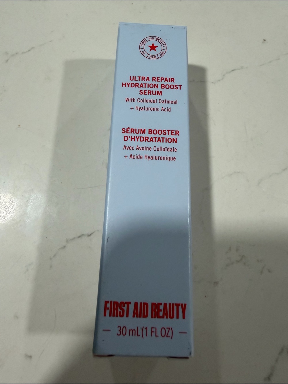 First Aid Beauty Hydration Boost Serum Bottle - White and Red
